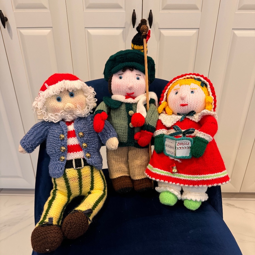 Vintage hand knit trio of Christmas Carollers. Three large hand knit figurines.